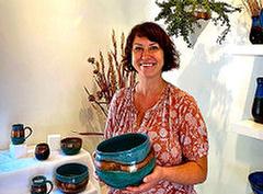 Brentwood-Darlington artist Carrie Carlson showed THE BEE one of her pottery pieces at Portland Open Studios event in early October.