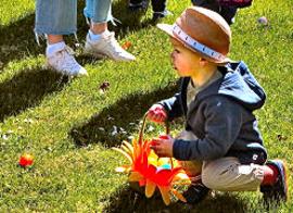Nearby, Sellwood resident Kateland King had an eye on her son Evan, here  who was way too fully occupied picking up eggs to pose for any old BEE photos. But we got this one anyway. 