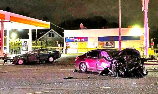 Wreckage was strewn across the intersection of S.E. McLoughlin Boulevard at Holgate by a crash caused by an intoxicated driver speeding through a red light with a suspended license. The driver of the car he hit was severely injured, and that drivers passenger was killed.