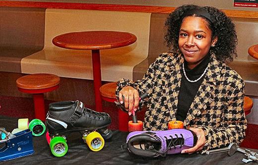 Oaks Park Roller Rinks STEM Program Coordinator and Educator  Milan Woods  demonstrated, for those attending, the mechanics and engineering of a roller skate.