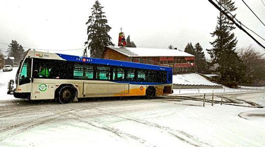 The tracks tell the story: After skidding out in the snow near the top of the hill on S.E. 45th Avenue in Brentwood-Darlington, this bus got stuck in the intersection  and then awaited help from TriMet.