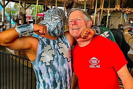 At Oaks Amusement Park, while scouting locations for their exhibition at the upcoming Multnomah County Fair, Big Tsuky  founder of Portland Lucha Libre  gave an impromptu wrestling lesson to Friends of the Multnomah County Fair President Larry Smith.