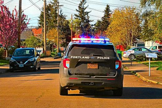 This is the quiet neighborhood on S.E. Harney Street where two cars with armed people inside fired at each other on Sunday, April 13th. A few parked cars nearby suffered gunshot damage.