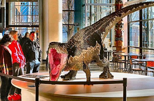 In the OMSI lobby outside the Jurassic World exhibition, this realistic LEGO model stops people cold, as they pass by.