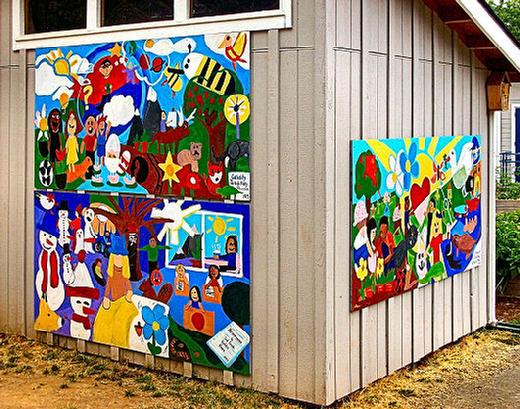 New murals are displayed on the four sides of the recently-built garden shed at Woodstock Elementary School, and are visible along S.E. 48th Avenue near Woodstock Park.