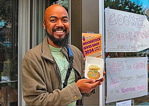 Woodstock Gives Back participant Jeremy Daniels, co-owner of the Viking Soul Food restaurant on Woodstock Boulevard next to the ACE Hardware Store, said the proceeds from their cookie-decorating craft activity would go to supporting the Woodstock Pantry at All Saints Church.