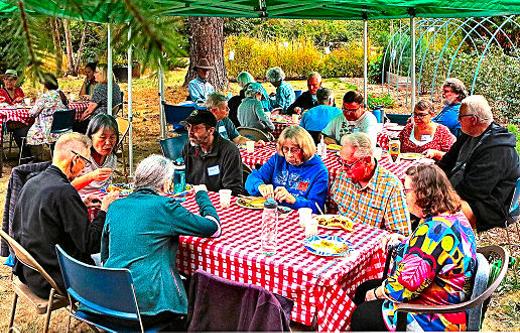 Its a good thing there were canopies over the tables, because before this celebratory meal ended at the Master Gardener Harvest Potluck Party in Brentwood-Darlington, a late-summer rainstorm swept in  but it didnt dampen any spirits or send anyone home early.