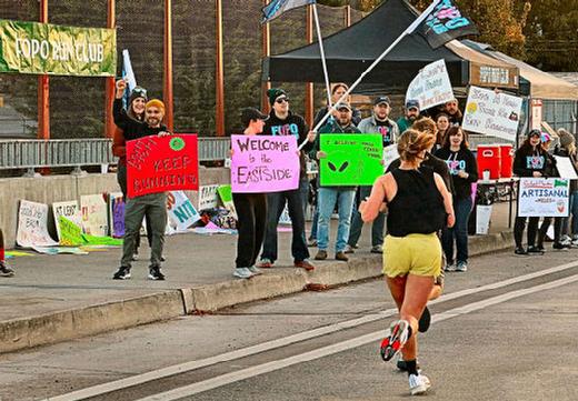 From the Foster-Powell neighborhood, members of the FoPo Run Club again were on hand to cheer on runners as they crossed the Sellwood Bridge.