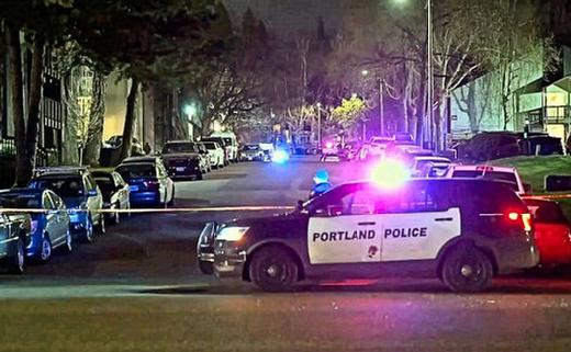 Police officers blocked off the street leading into the Wimbledon Square Apartments on S.E. 28th Avenue, after a mother living there was found dead from gunshots.