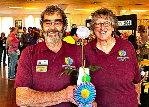 Bob and Terry Schroeder of Bremerton, Washington, proudly show their top prize-winning entry, Westerton Ella Grace  which was adjudged the Best Single Fully-Double in Show.