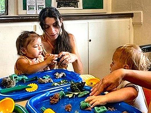 The �Messy Art� class at the Woodstock Community Center has a weekly theme; here it was �Nature�, and toddlers had fun depicting that with Play Dough.